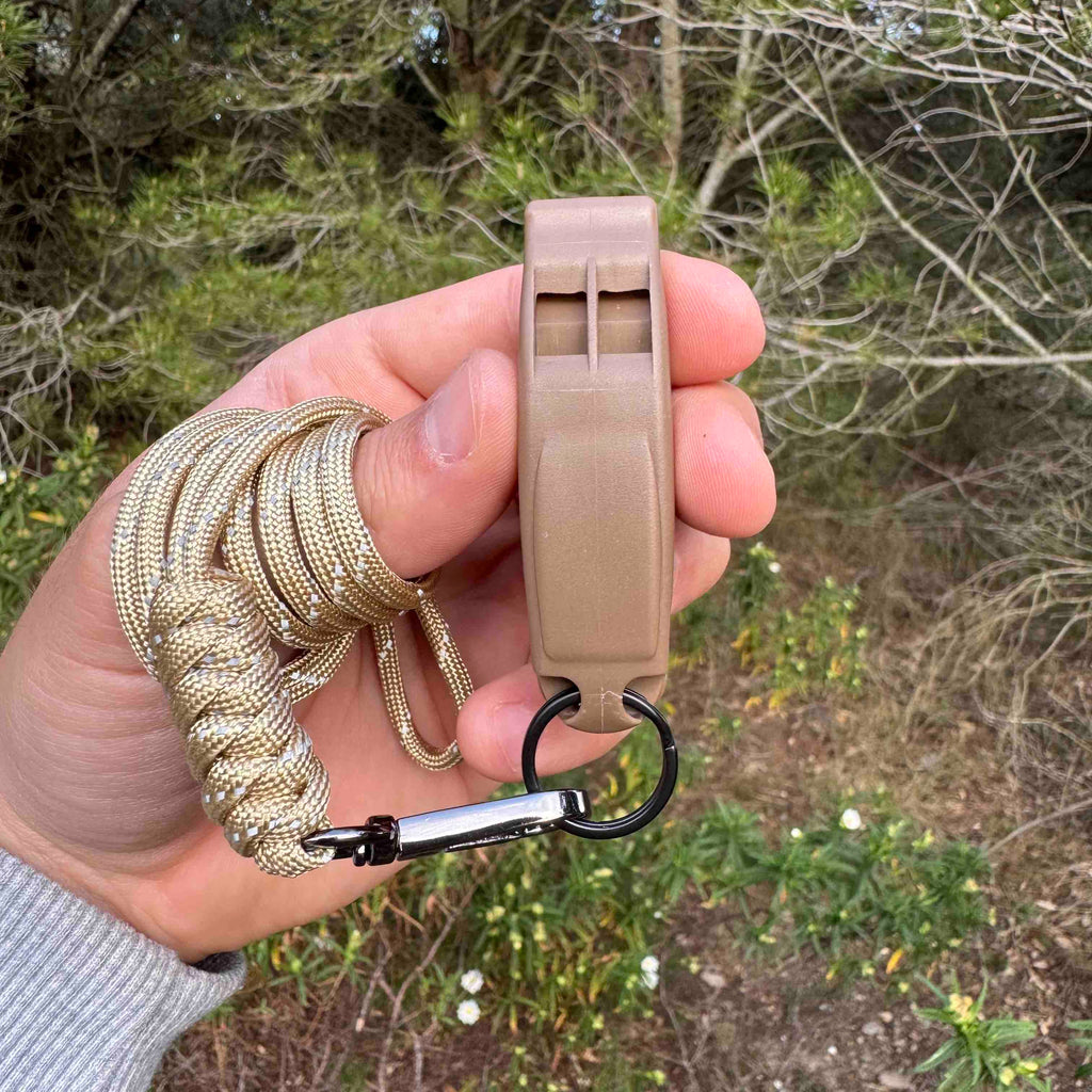 Silbato de emergencia con paracord reflectante