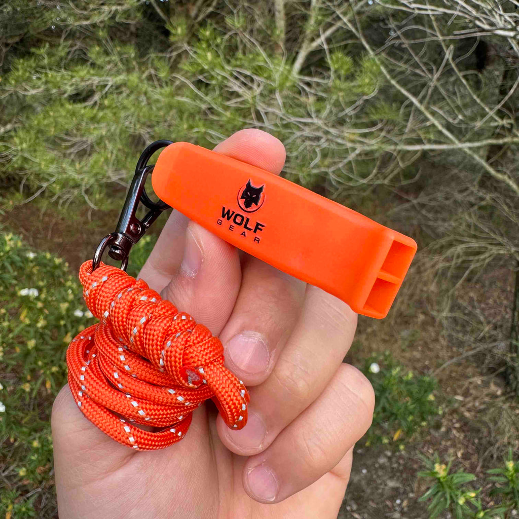Silbato de emergencia con paracord reflectante