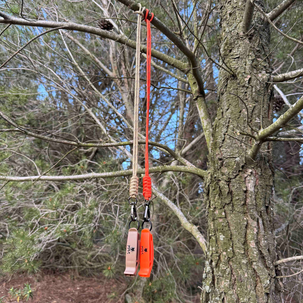 Silbato de emergencia con paracord reflectante