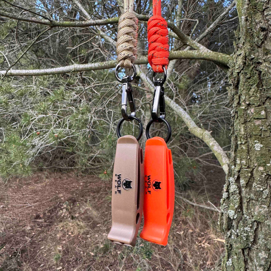 Silbato de emergencia con paracord reflectante