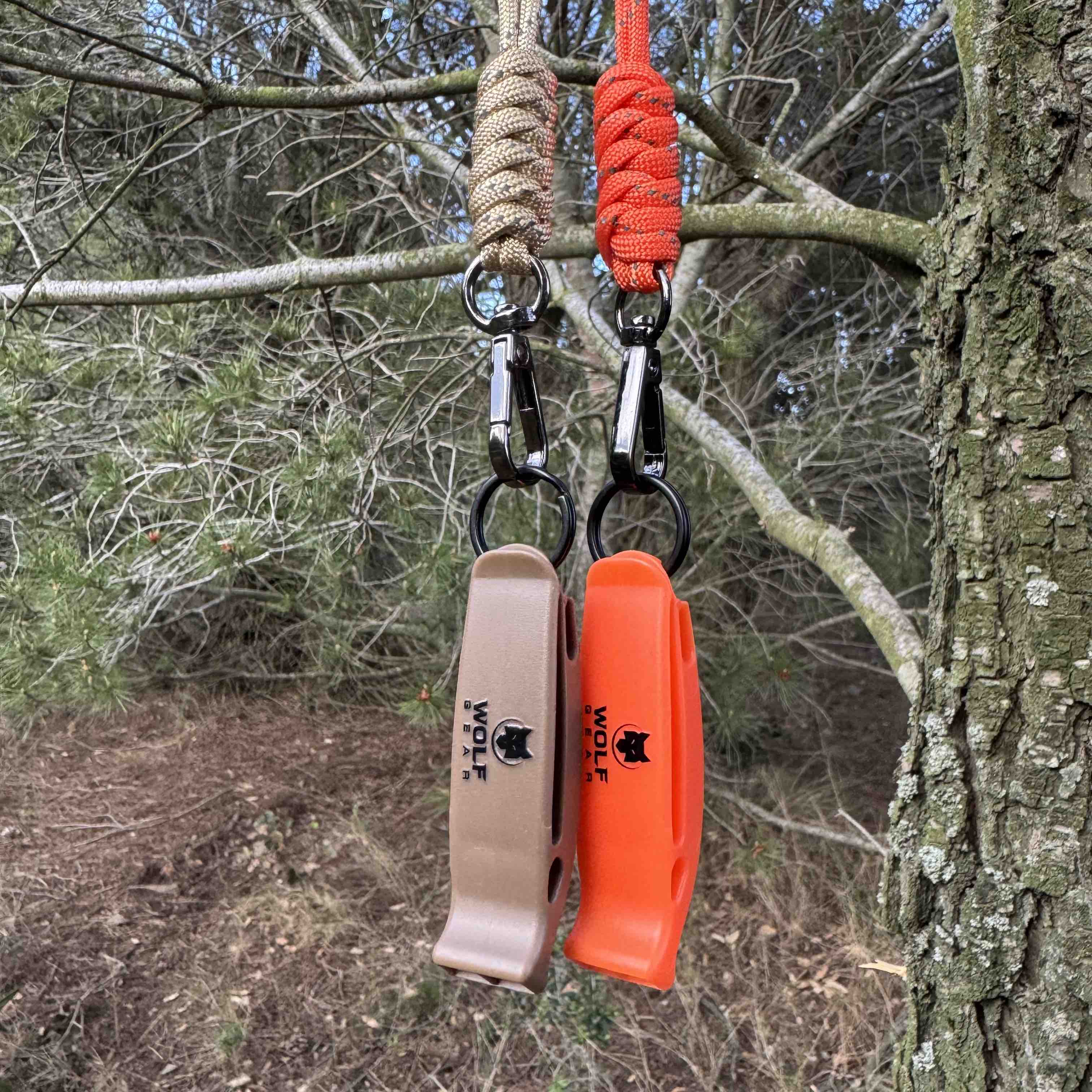 Silbato de emergencia con paracord reflectante